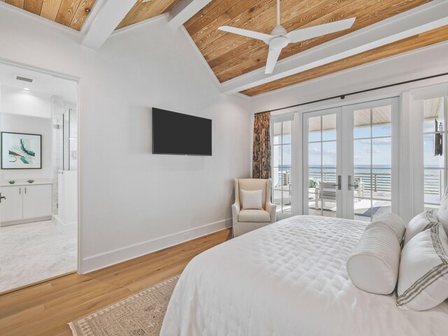 bedroom with ceiling fan, hardwood / wood-style floors, ensuite bathroom, access to outside, and french doors