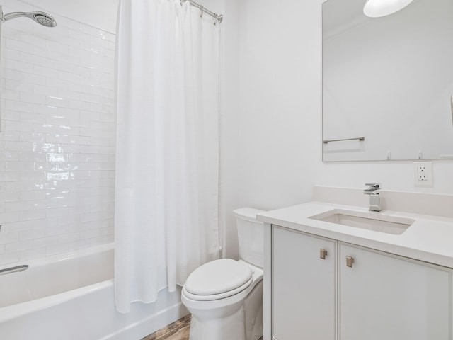 full bathroom featuring shower / bath combination with curtain, vanity, toilet, and hardwood / wood-style flooring