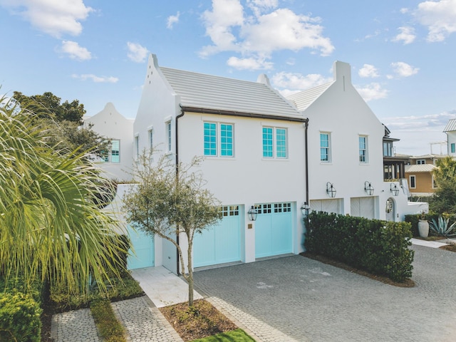 view of front of home with a garage