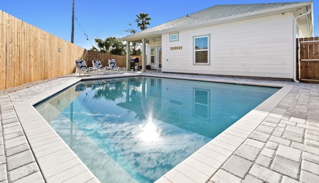 view of pool featuring a patio area