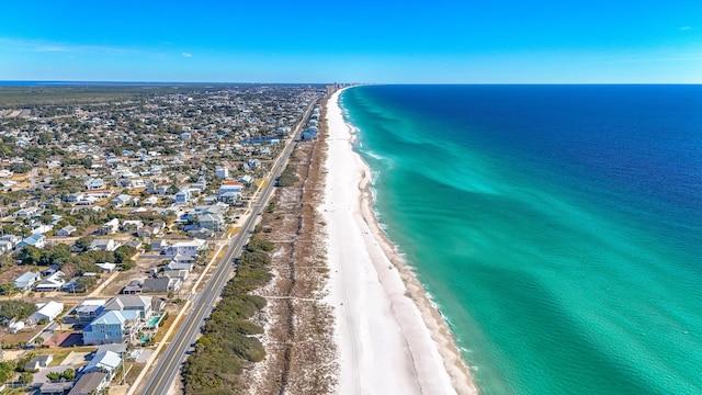 aerial view featuring a water view and a view of the beach