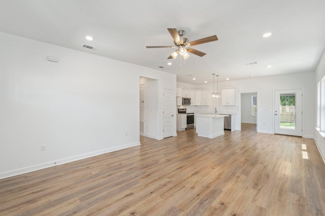 LOT7 Tansey St, Crestview, FL 32539 - unfurnished living room with ceiling fan and light hardwood / wood-style floors