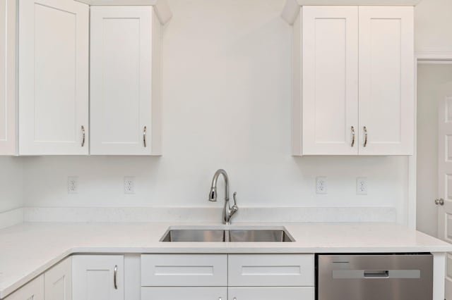 LOT7 Tansey St, Crestview, FL 32539 - kitchen with light stone counters, sink, white cabinets, and dishwasher