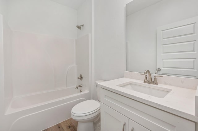 LOT7 Tansey St, Crestview, FL 32539 - full bathroom with toilet, vanity, tub / shower combination, and hardwood / wood-style floors