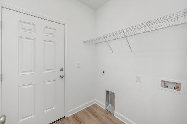 LOT7 Tansey St, Crestview, FL 32539 - laundry area featuring hookup for a washing machine, electric dryer hookup, and light hardwood / wood-style flooring