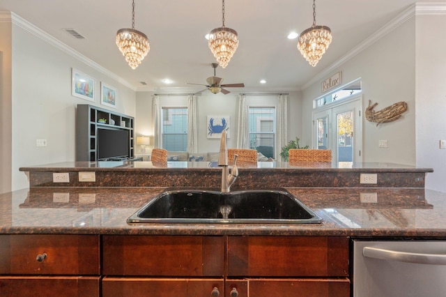 kitchen featuring french doors, sink, stainless steel dishwasher, crown molding, and ceiling fan with notable chandelier