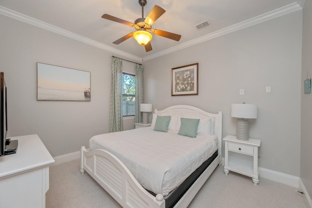 bedroom featuring ceiling fan, ornamental molding, and light carpet