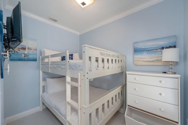 bedroom with light carpet and crown molding