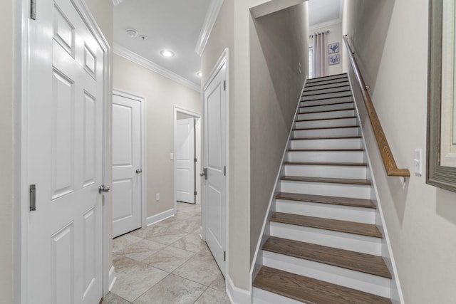 stairway with crown molding