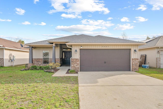 view of front facade with a garage and a front yard