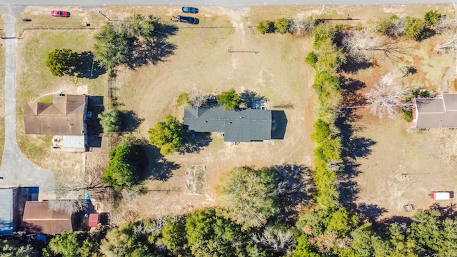 birds eye view of property featuring a rural view