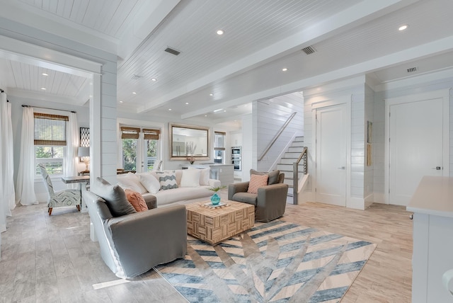 living room featuring wooden ceiling, beamed ceiling, and light hardwood / wood-style floors