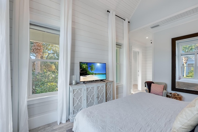 41 Tresca Lake Ct, Santa Rosa Beach, FL 32459 - bedroom featuring wood finished floors and lofted ceiling