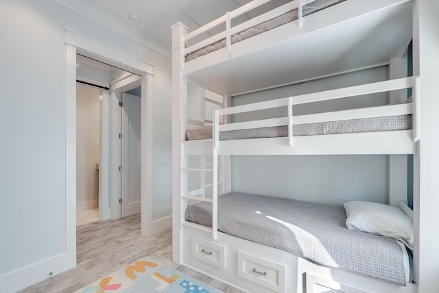 41 Tresca Lake Ct, Santa Rosa Beach, FL 32459 - unfurnished bedroom featuring wood finished floors and baseboards