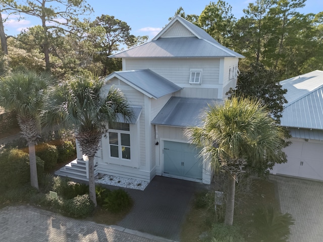 41 Tresca Lake Ct, Santa Rosa Beach, FL 32459 - view of front facade with a metal roof and a garage