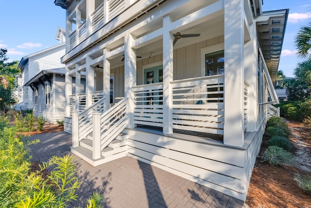 doorway to property featuring ceiling fan and covered porch