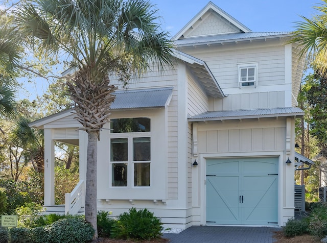 41 Tresca Lake Ct, Santa Rosa Beach, FL 32459 - view of front of house featuring a garage and board and batten siding