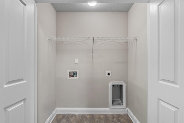 laundry room with washer hookup, a textured ceiling, and hookup for an electric dryer