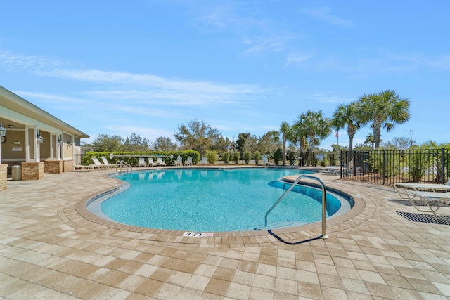 view of swimming pool with a patio area