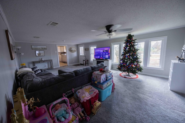 carpeted living room with ceiling fan, ornamental molding, and a textured ceiling