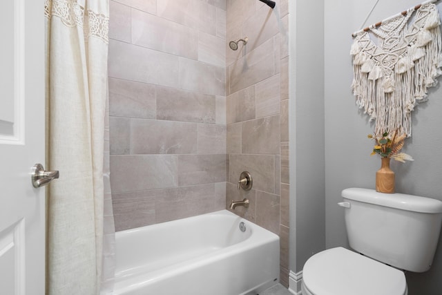 bathroom with toilet and shower / tub combo with curtain