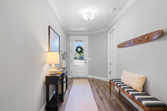 foyer entrance featuring dark wood-type flooring and ornamental molding