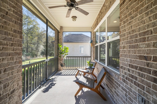 sunroom / solarium with ceiling fan