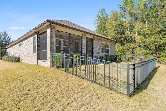 view of property exterior with ceiling fan and a yard