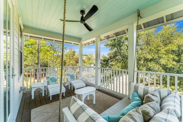 sunroom / solarium with ceiling fan