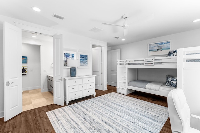 bedroom with hardwood / wood-style floors and ceiling fan