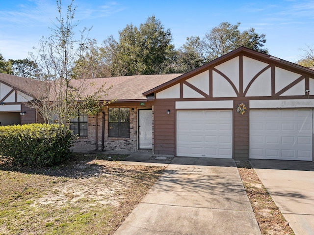 tudor-style house with a garage