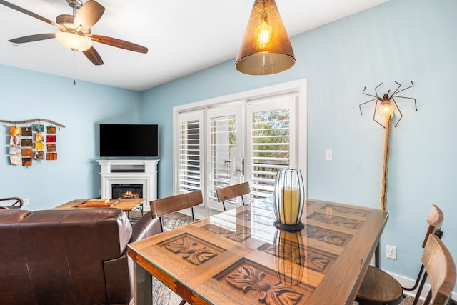 dining room with ceiling fan