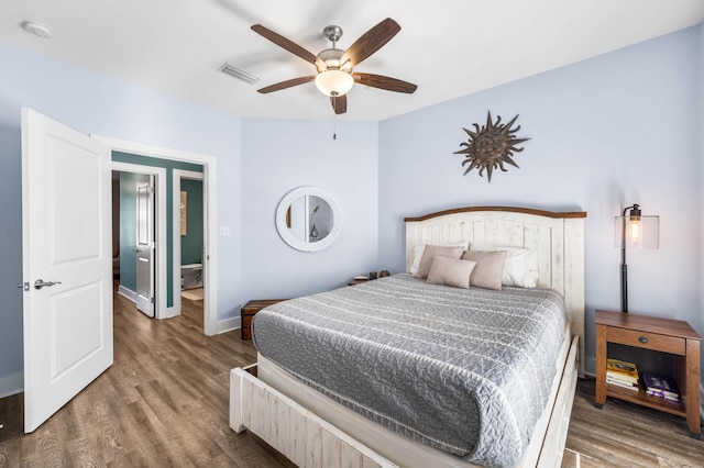 bedroom with hardwood / wood-style flooring and ceiling fan