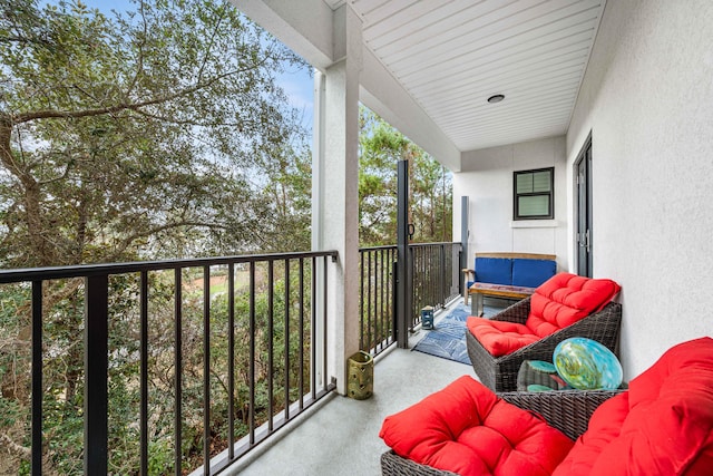 balcony with an outdoor hangout area