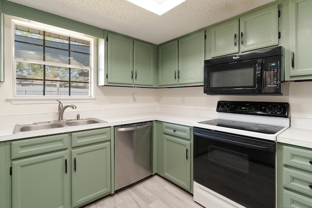 kitchen featuring white electric range oven, a textured ceiling, sink, green cabinetry, and dishwasher