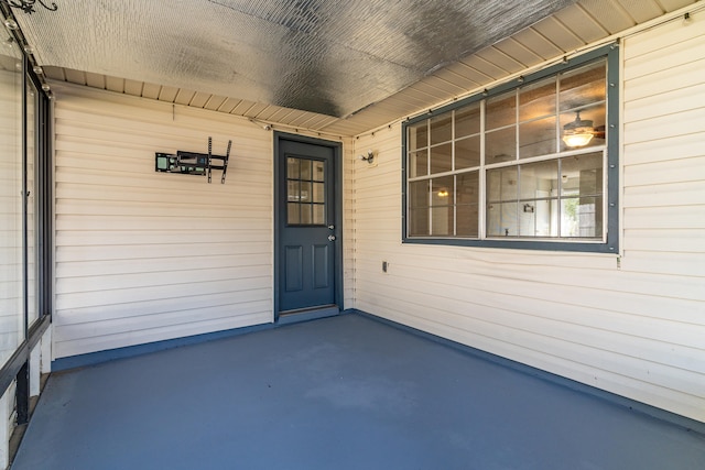 property entrance featuring covered porch