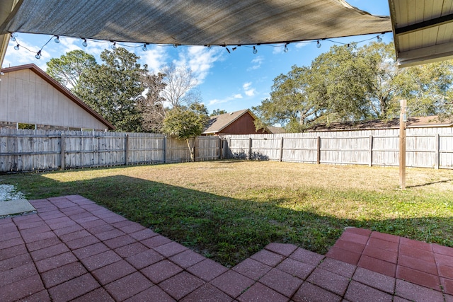 view of yard with a patio area