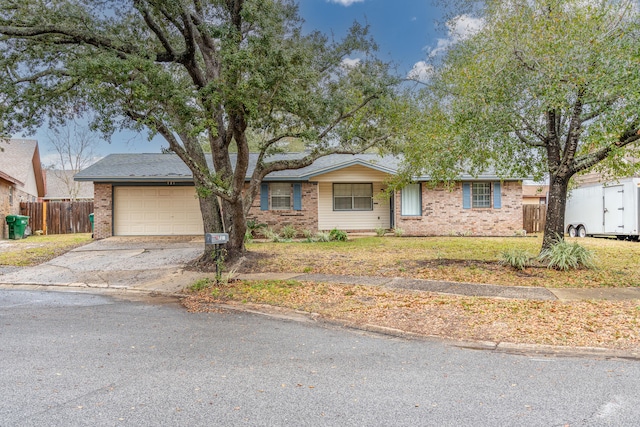 single story home featuring a garage