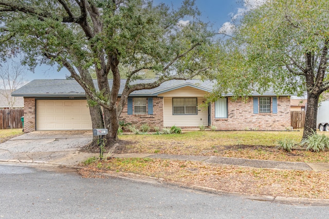 ranch-style home with a garage