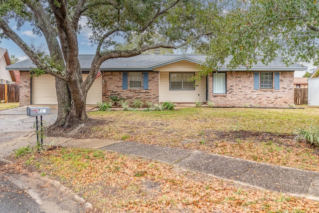 ranch-style home with a garage