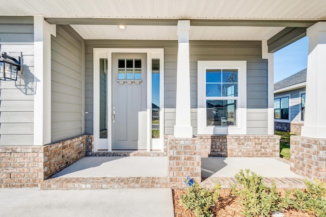 entrance to property with covered porch