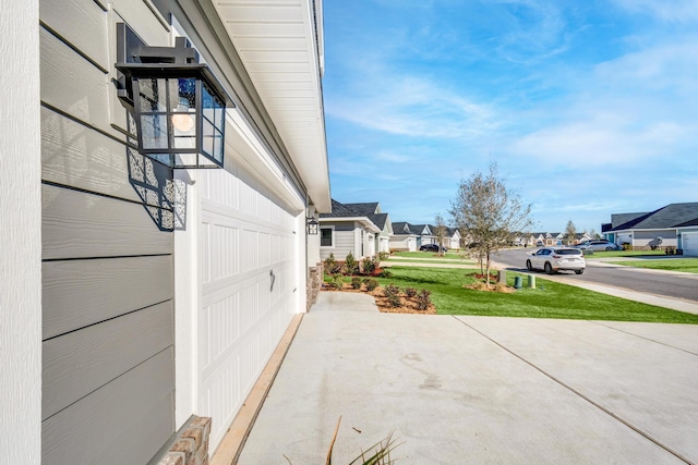 view of home's exterior with a yard