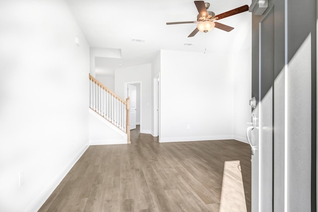 unfurnished living room with ceiling fan and light hardwood / wood-style flooring