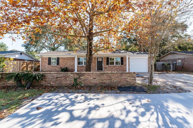 single story home featuring a garage