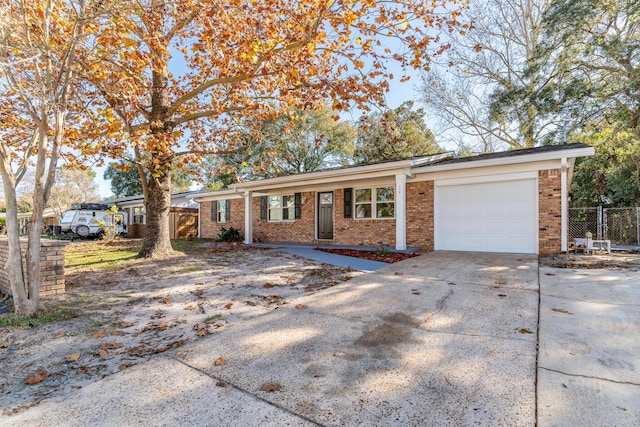 single story home featuring a garage