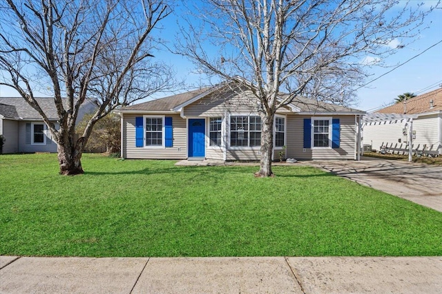 ranch-style home with a front yard