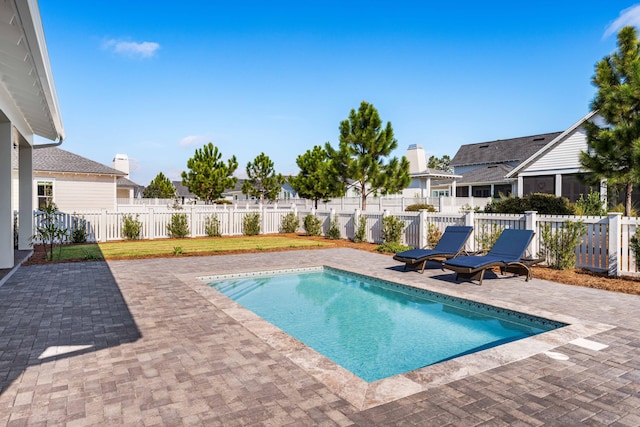 view of pool featuring a patio