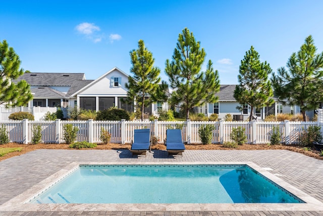 view of pool featuring a patio area