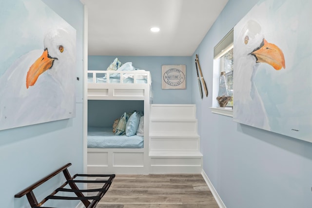 bedroom featuring recessed lighting, baseboards, and wood finished floors