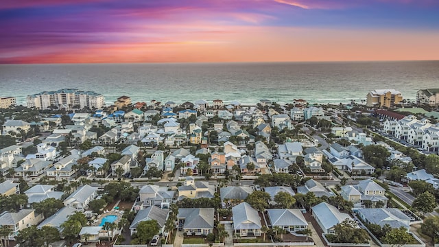 birds eye view of property featuring a residential view and a water view